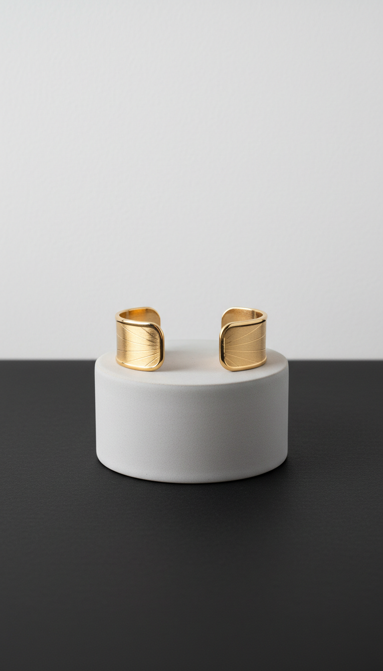 Gold cuff with sculptural silhouette